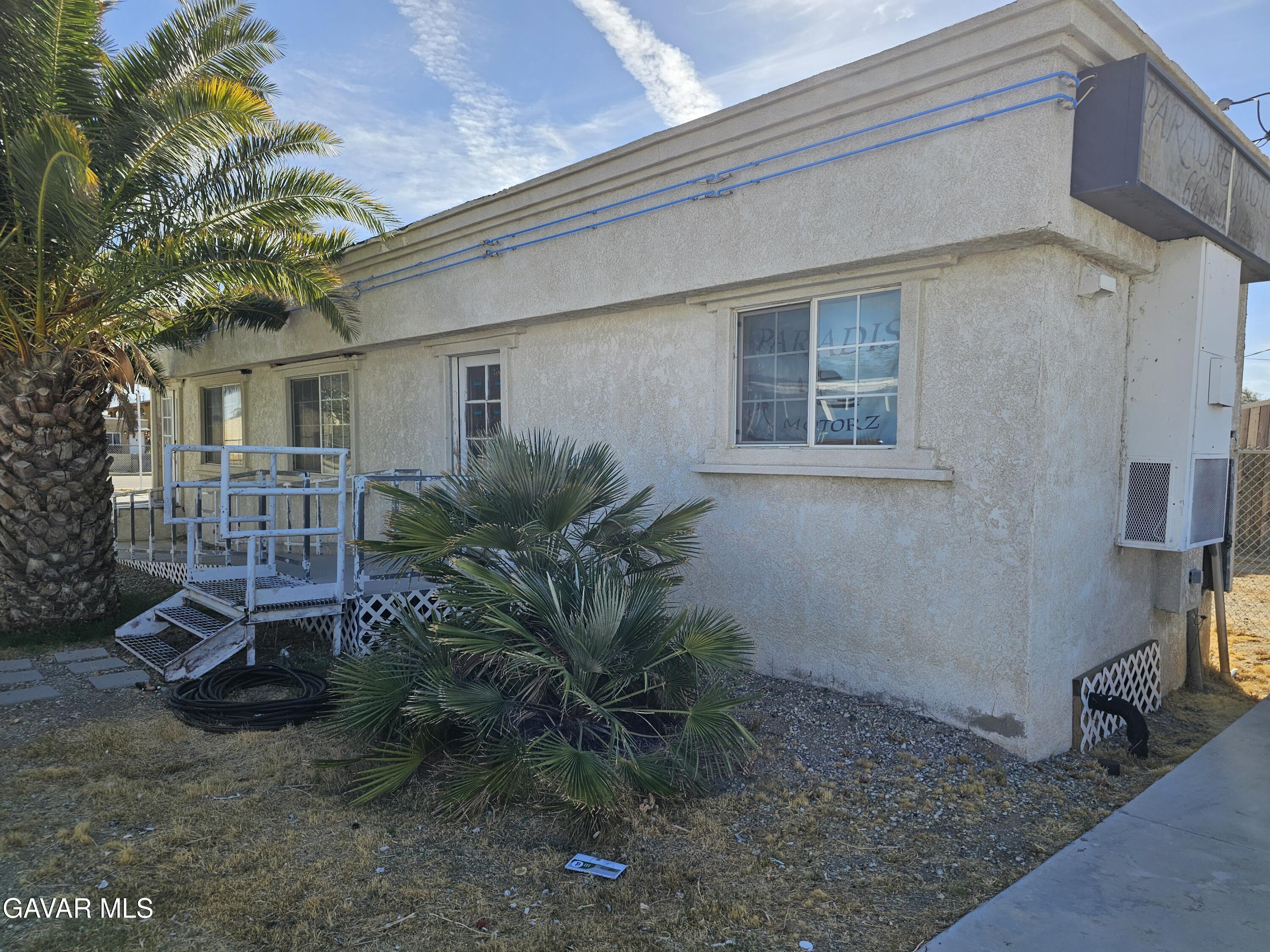 16043 K Street Mojave, CA 93501 - Photo 4 of 8 a view of backyard of a house