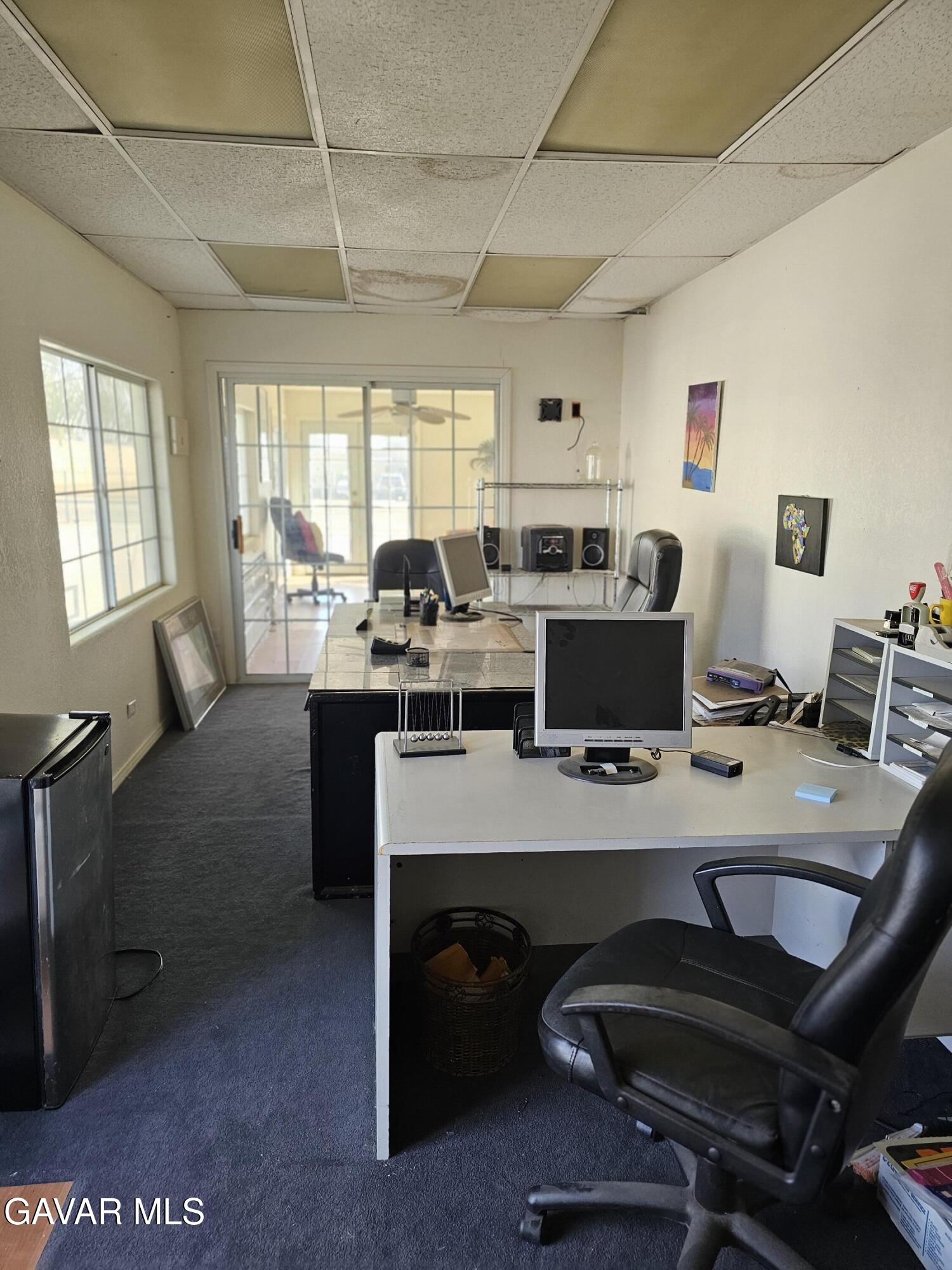 16043 K Street Mojave, CA 93501 - Photo 5 of 8 a view of a workspace with furniture