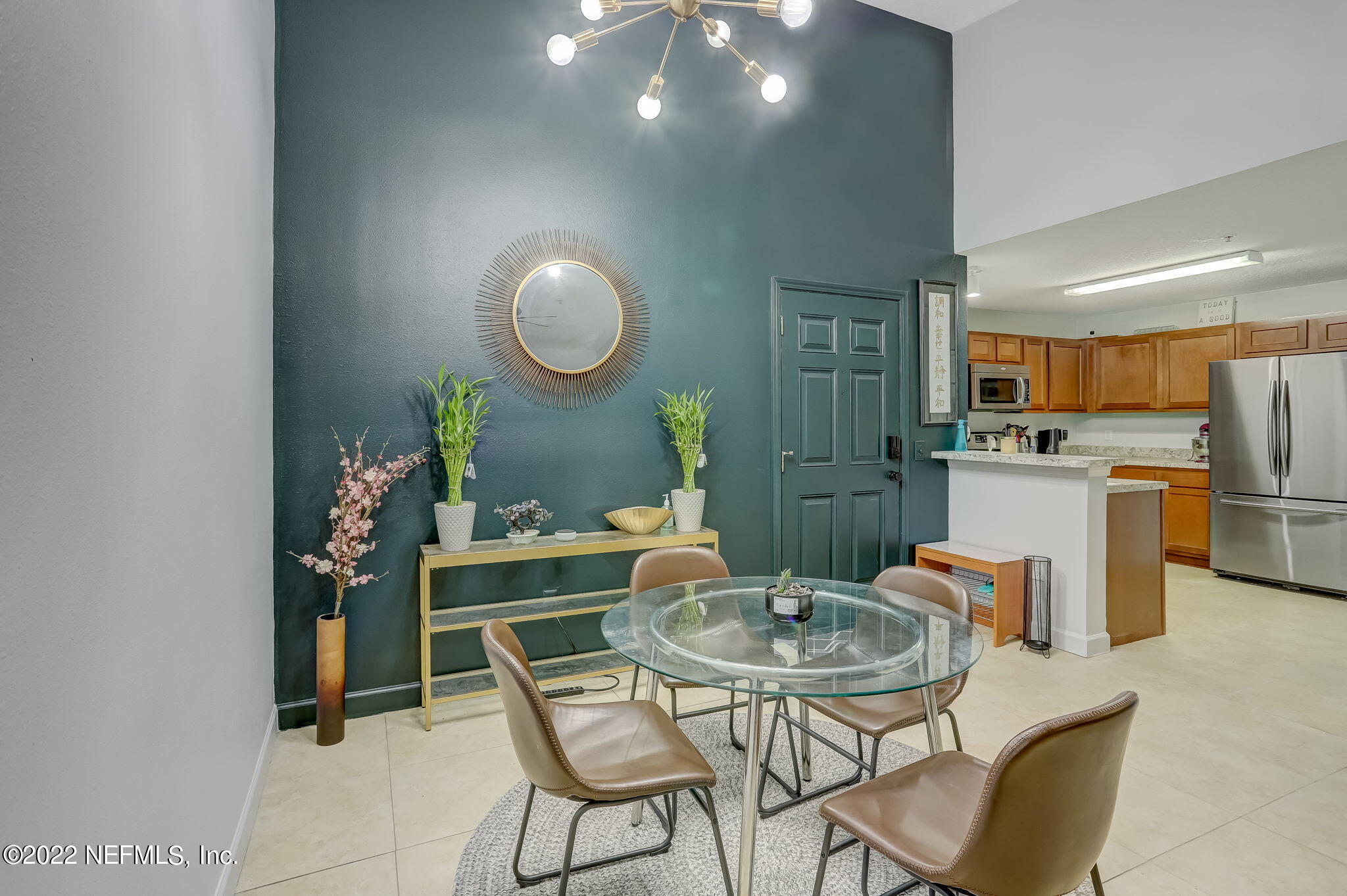 3690 Kirkpatrick Circle, Unit 710 Jacksonville, FL 32210 - Photo 12 of 34 a view of a dining room with furniture