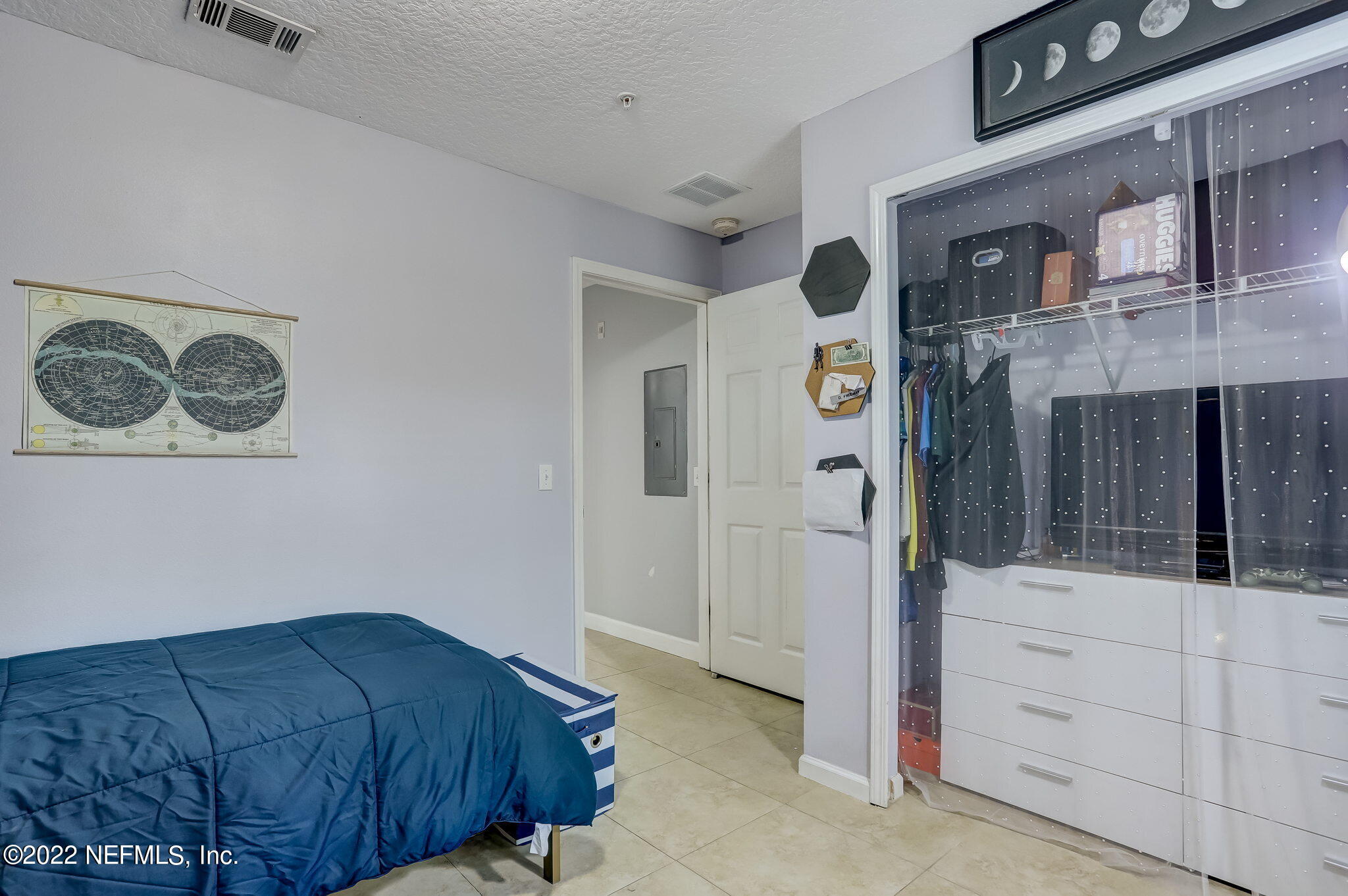 3690 Kirkpatrick Circle, Unit 710 Jacksonville, FL 32210 - Photo 24 of 34 a bedroom with a bed and a window