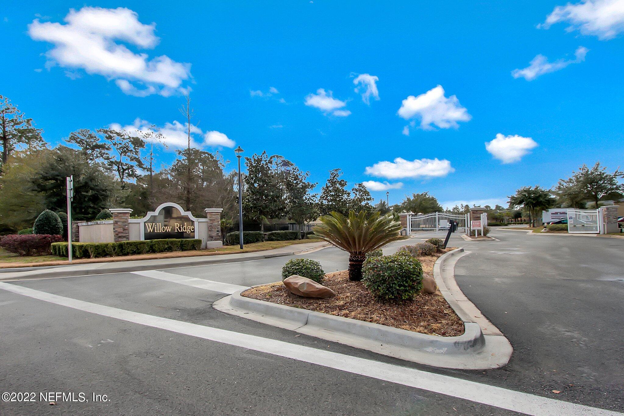 3690 Kirkpatrick Circle, Unit 710 Jacksonville, FL 32210 - Photo 3 of 34 a view of a street with a houses