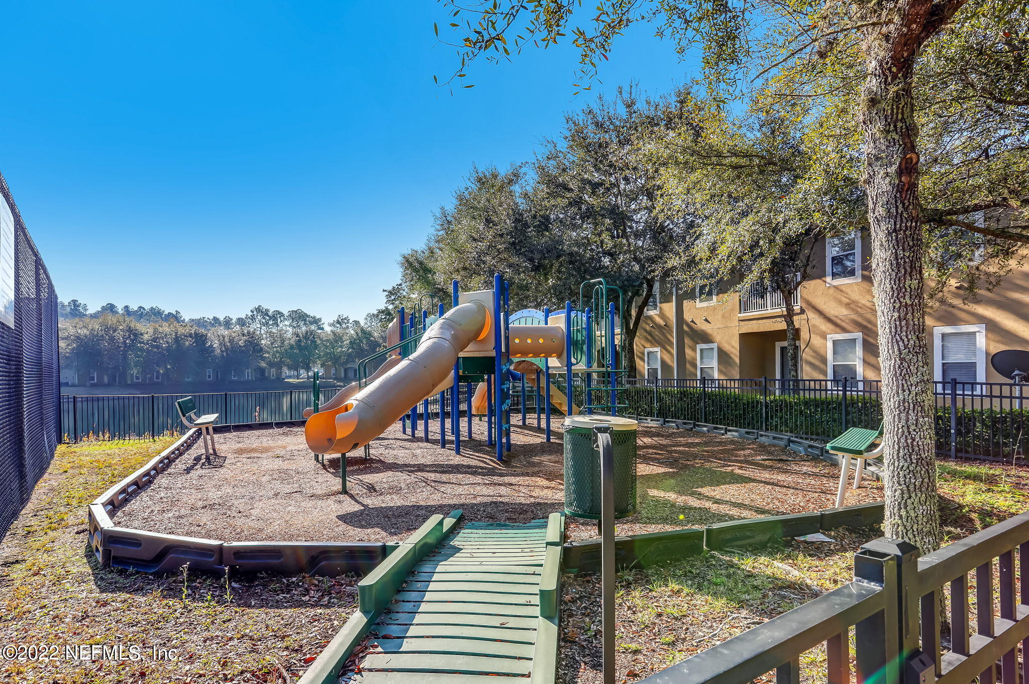 3690 Kirkpatrick Circle, Unit 710 Jacksonville, FL 32210 - Photo 34 of 34 a view of a wooden deck and a lake view