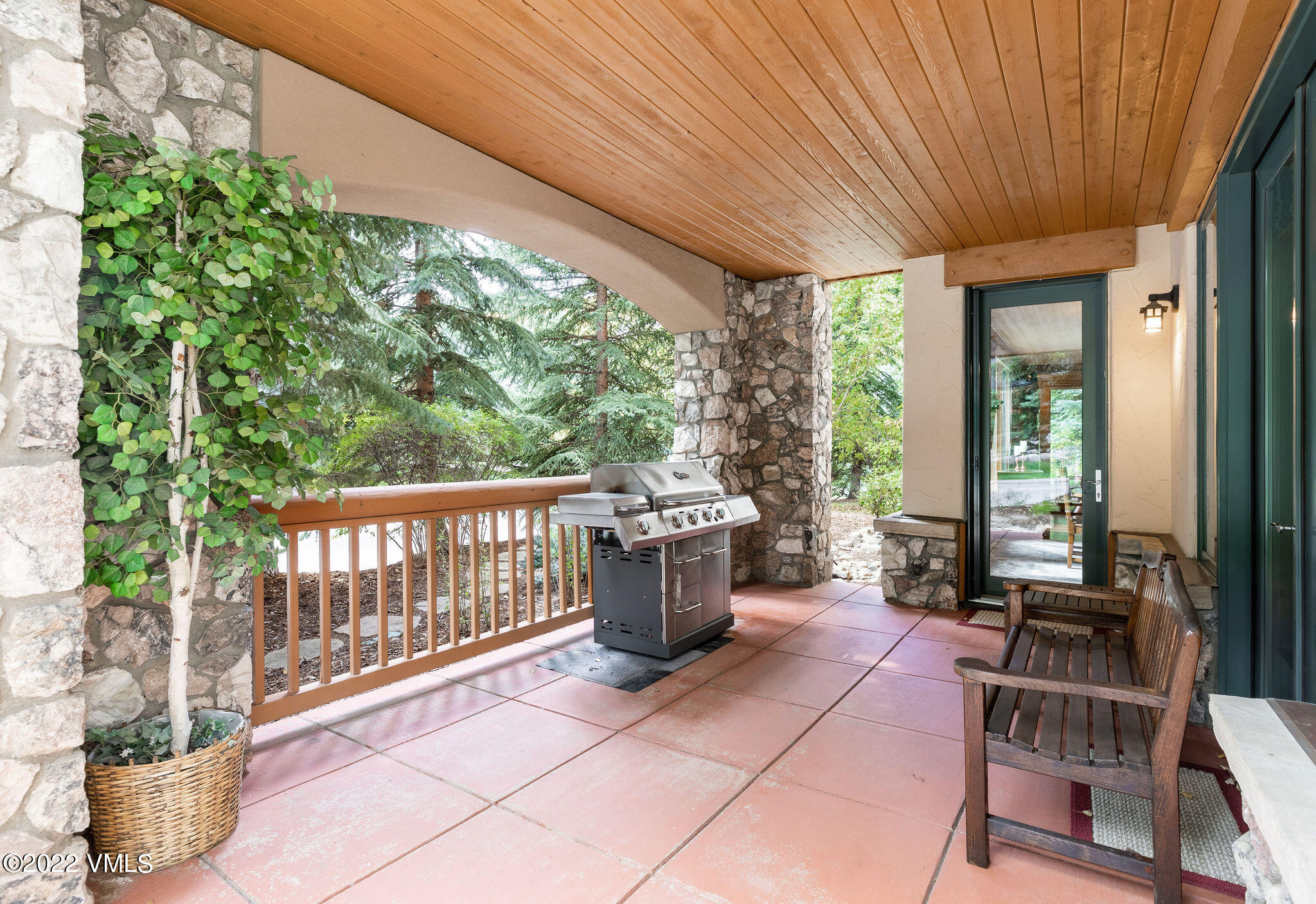 51 Offerson Road, Unit 114 Beaver Creek, CO 81620 - Photo 12 of 30 a view of a patio with chairs and potted plants