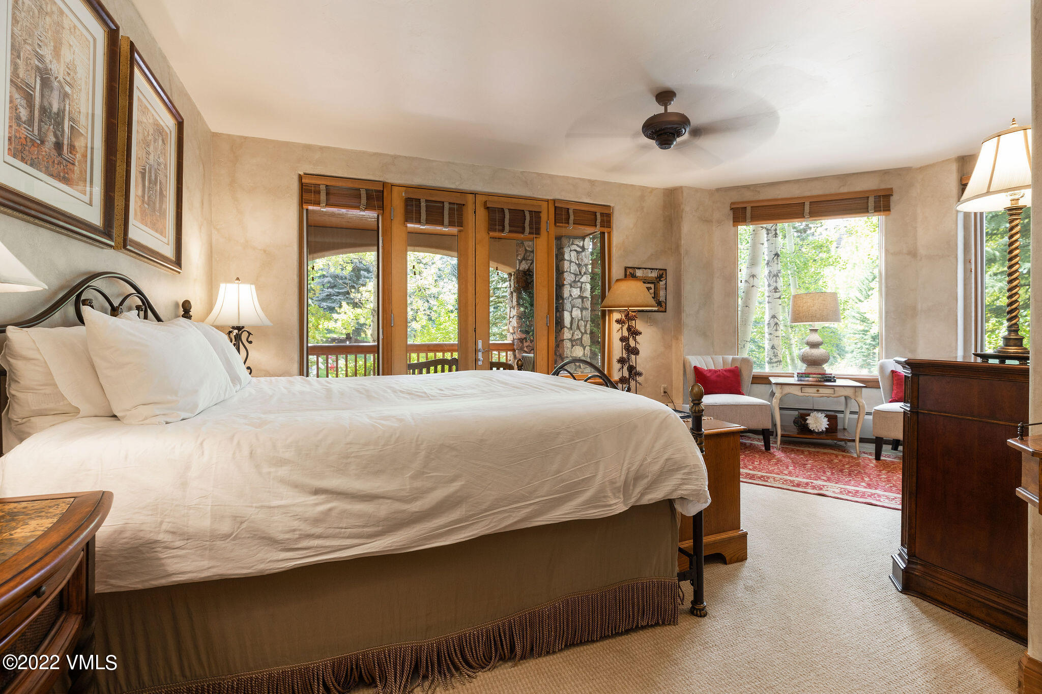 51 Offerson Road, Unit 114 Beaver Creek, CO 81620 - Photo 14 of 30 a bedroom with a bed couch and a large window