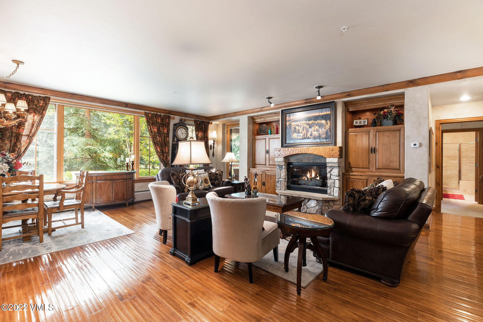 51 Offerson Road, Unit 114 Beaver Creek, CO 81620 - Photo 3 of 30 a living room with furniture fireplace and a large window