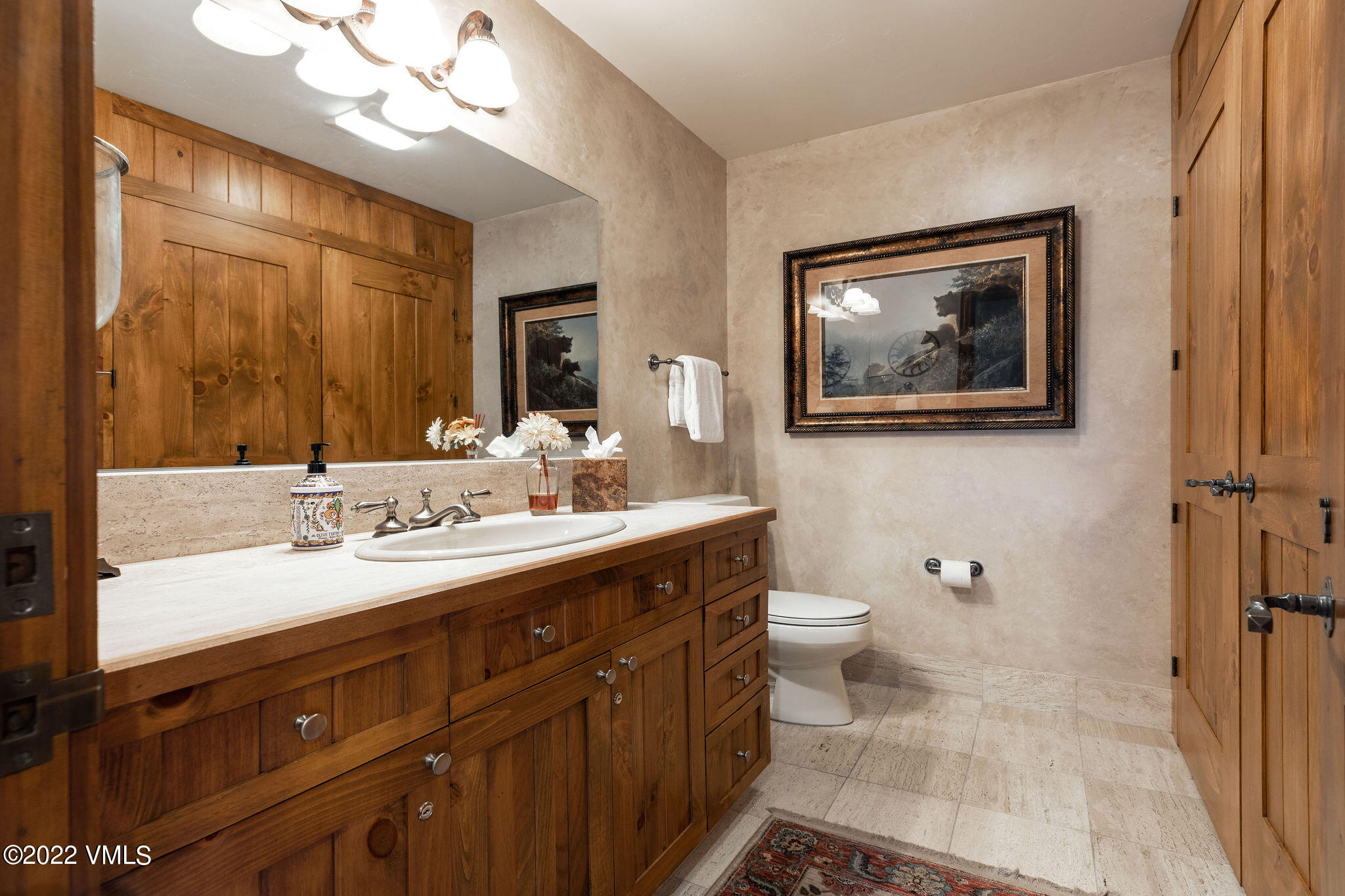51 Offerson Road, Unit 114 Beaver Creek, CO 81620 - Photo 8 of 30 a bathroom with a double vanity sink and a mirror