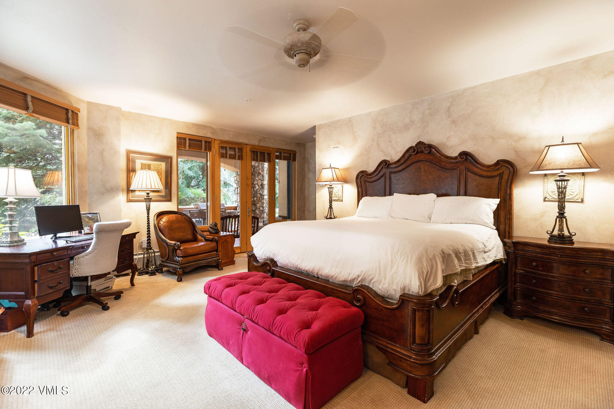 51 Offerson Road, Unit 114 Beaver Creek, CO 81620 - Photo 9 of 30 a spacious bedroom with a bed couch and a large window