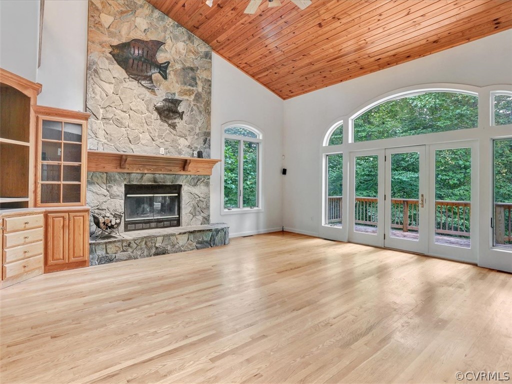 7461 Pine Ridge Road Mechanicsville, VA 23116 - Photo 17 of 42 a view of empty room with fireplace and wooden floor