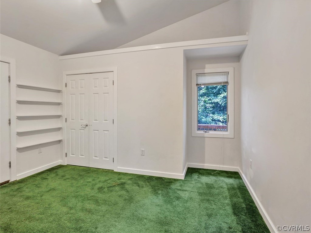 7461 Pine Ridge Road Mechanicsville, VA 23116 - Photo 32 of 42 an empty room with a wooden door