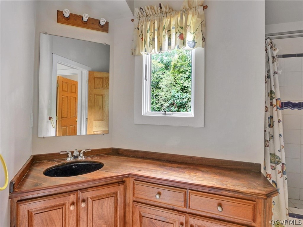 7461 Pine Ridge Road Mechanicsville, VA 23116 - Photo 33 of 42 a room with a sink and a window
