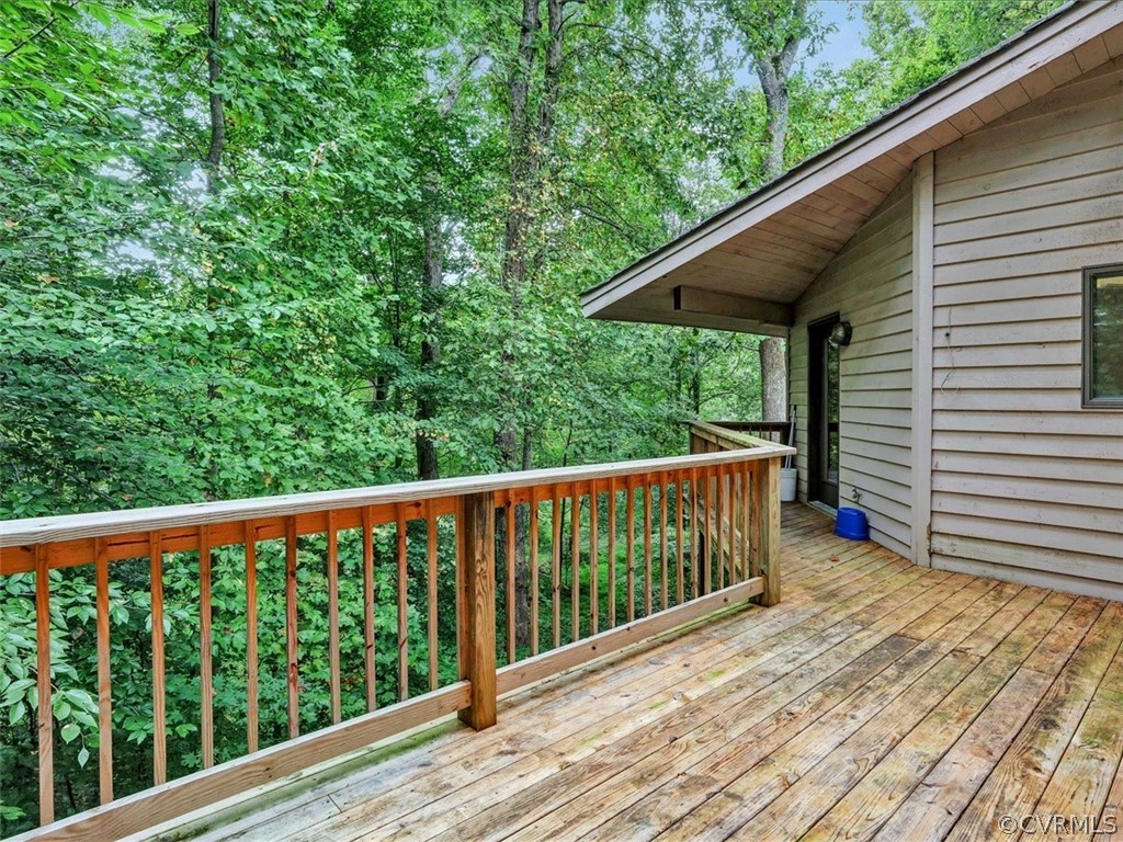 7461 Pine Ridge Road Mechanicsville, VA 23116 - Photo 41 of 42 a balcony with wooden floor and outdoor space