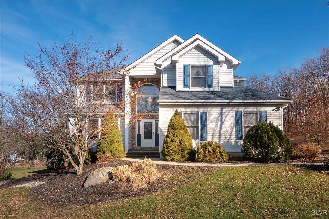 110 Deer Run Road Stroudsburg, PA 18360 - Photo 1 of 50 a front view of a house with garden