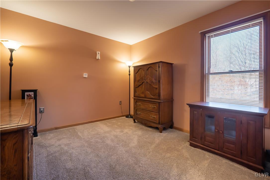 110 Deer Run Road Stroudsburg, PA 18360 - Photo 23 of 50 a view of an empty room with a fireplace and a window