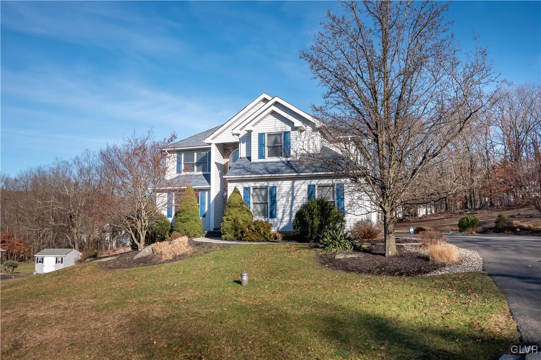 110 Deer Run Road Stroudsburg, PA 18360 - Photo 36 of 50 a front view of a house with garden