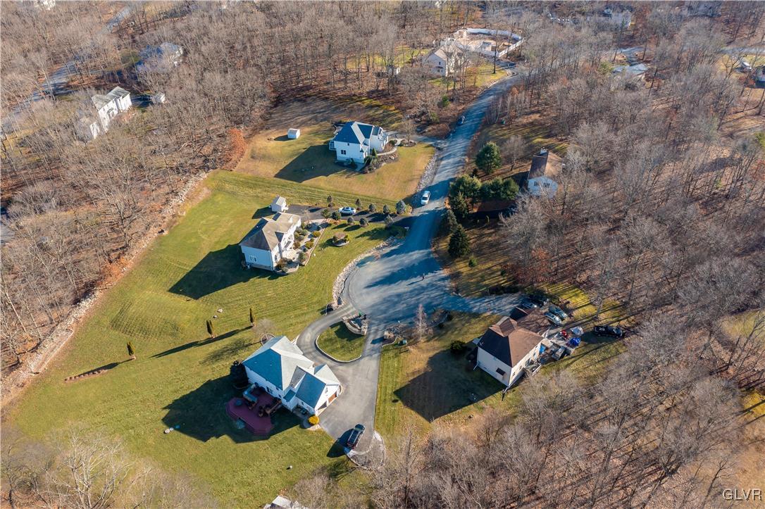 110 Deer Run Road Stroudsburg, PA 18360 - Photo 45 of 50 an aerial view of a house with a yard and trees