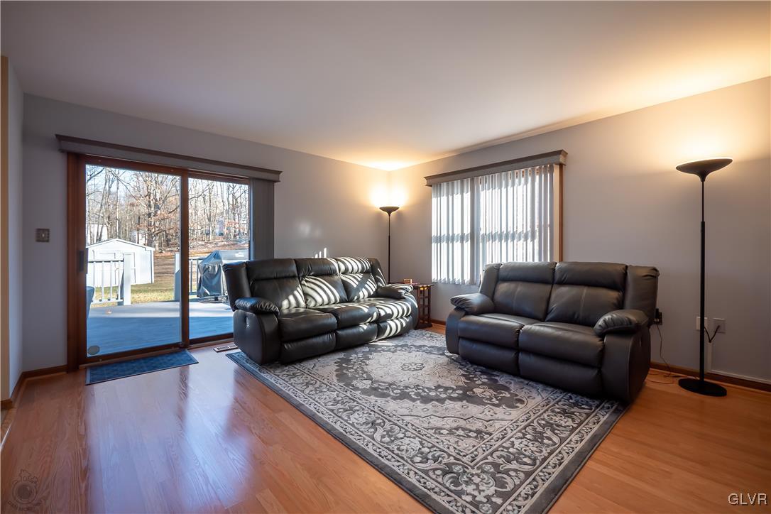 110 Deer Run Road Stroudsburg, PA 18360 - Photo 7 of 50 a living room with furniture and a rug
