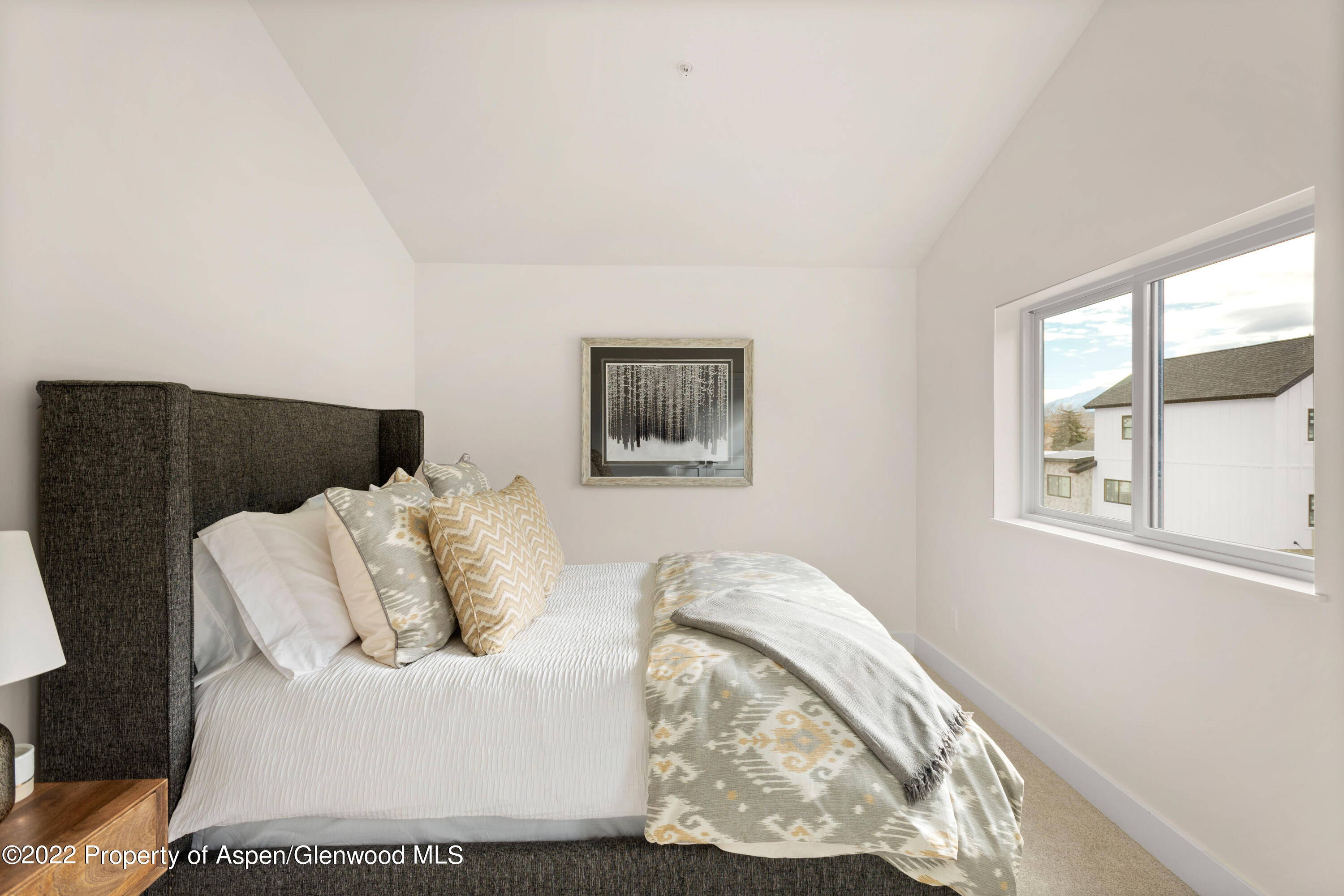4255 Ripple Lane Glenwood Springs, CO 81601 - Photo 3 of 4 a living room with furniture and a window