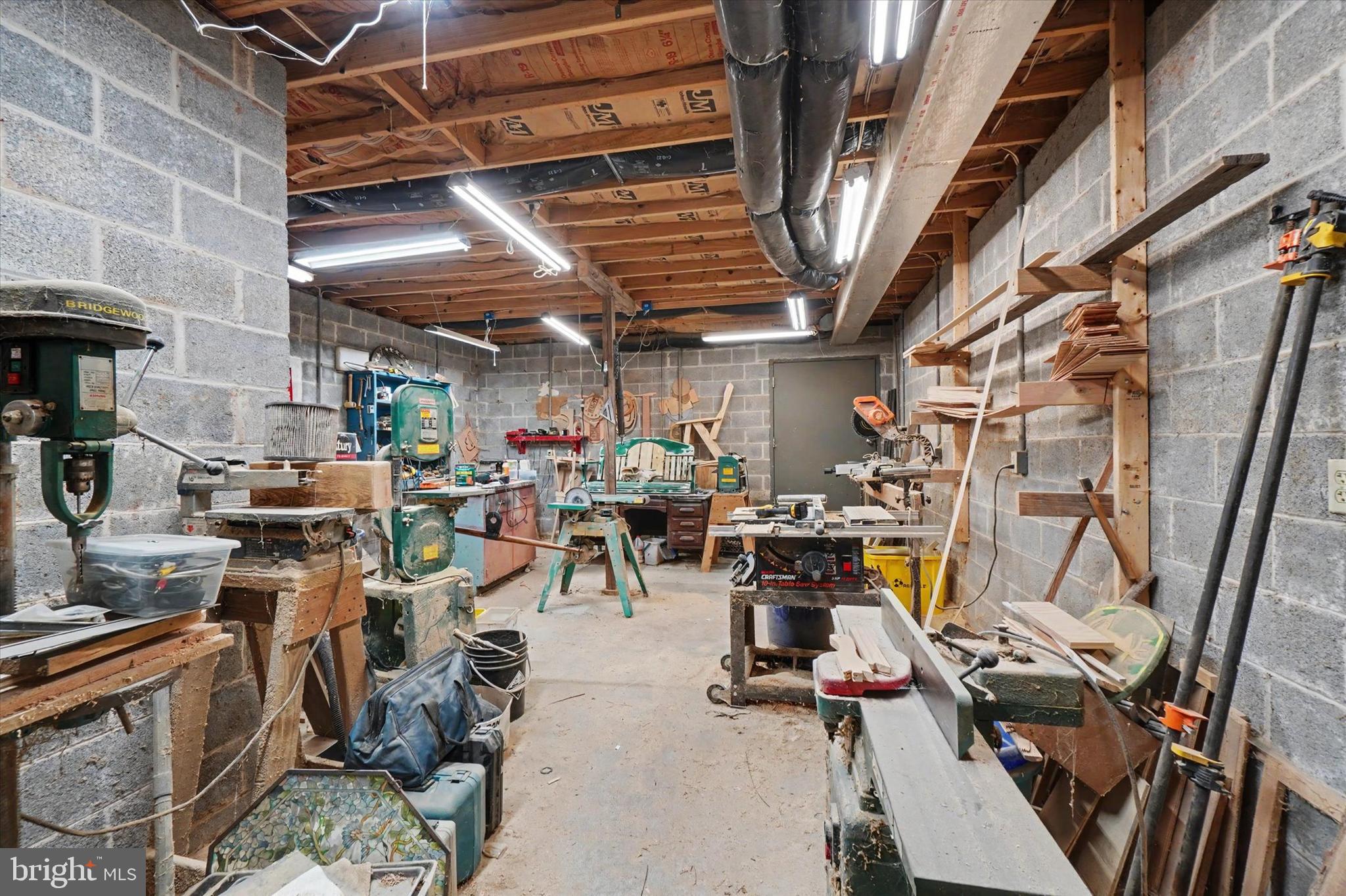 2285 Bremer Road Dover, PA 17315 - Photo 30 of 50 Work shop in basement with door to outside
