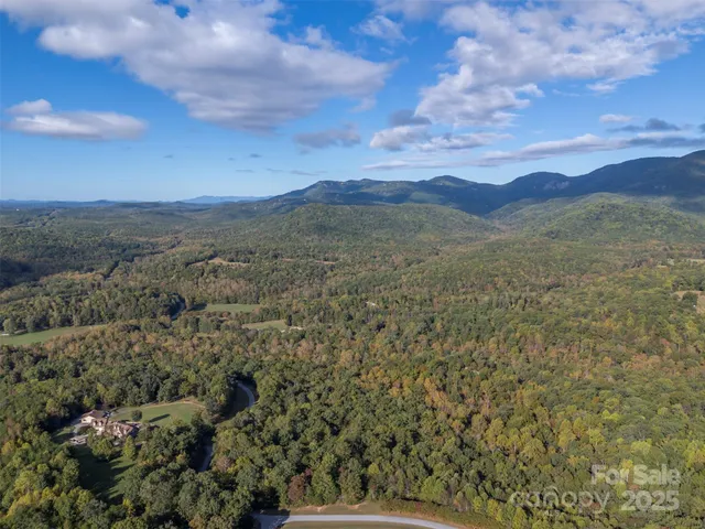 a view of mountain with sunset