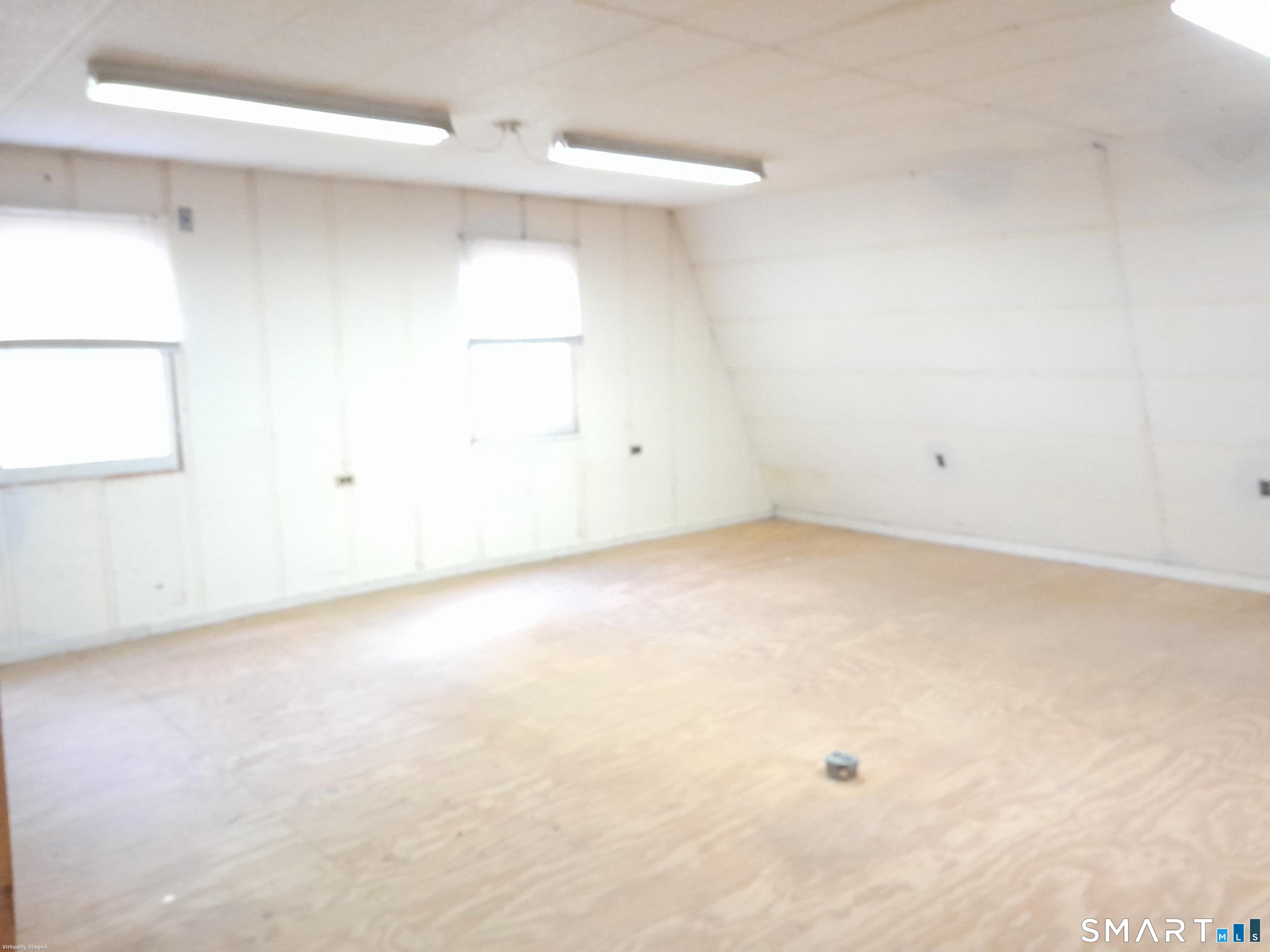 385 Cotton Hill Road New Hartford, CT 06057 - Photo 15 of 17 an empty room with a empty space