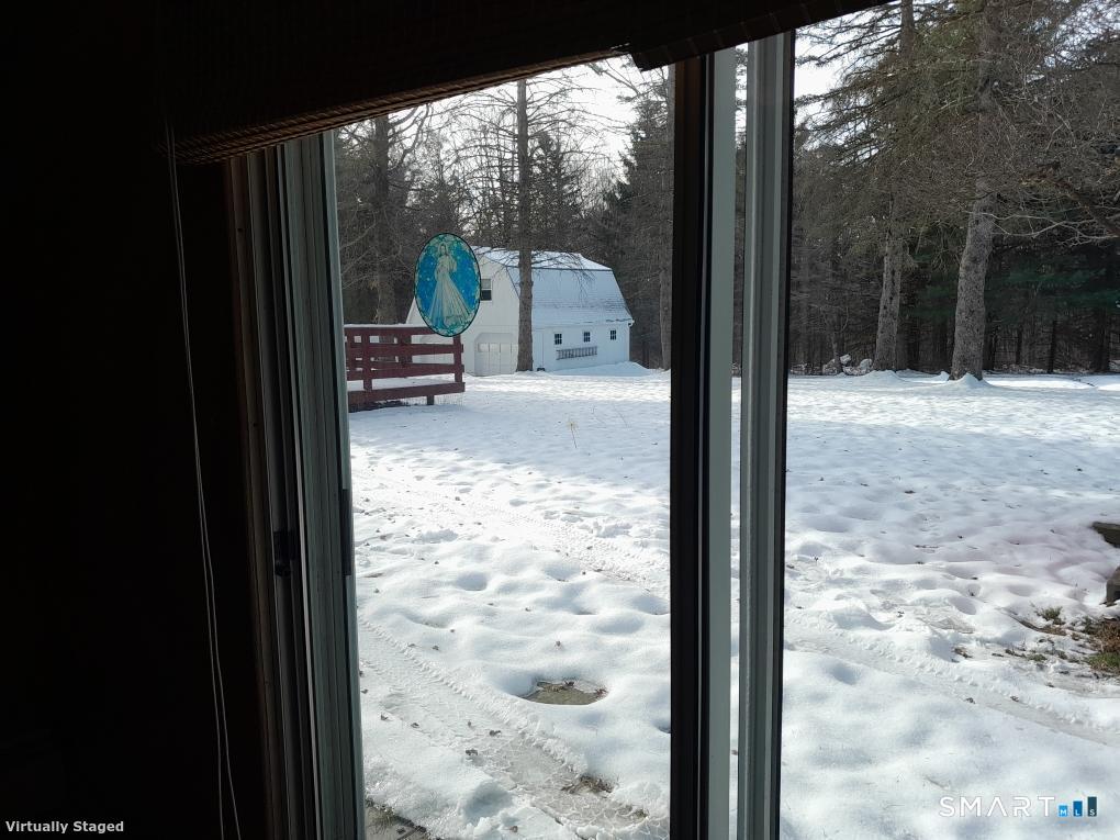 385 Cotton Hill Road New Hartford, CT 06057 - Photo 7 of 17 a view of a glass door with a yard