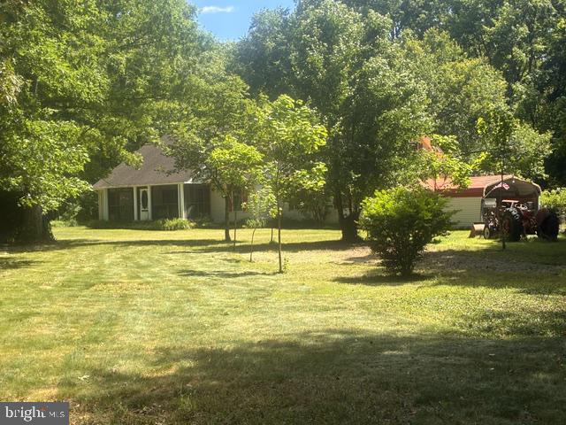 242 Firetower Road Camden Wyoming, DE 19934 - Photo 13 of 14 a view of a swimming pool with some trees