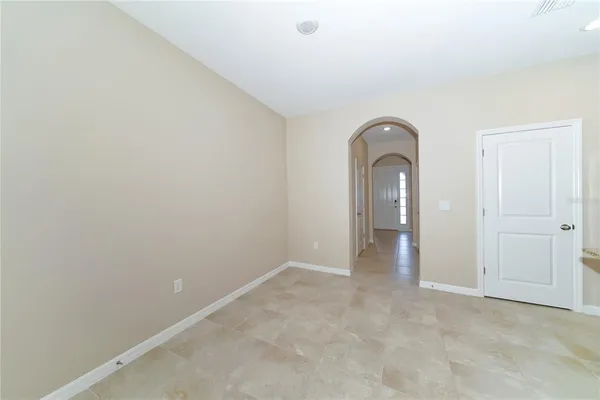 a view of an empty room and window