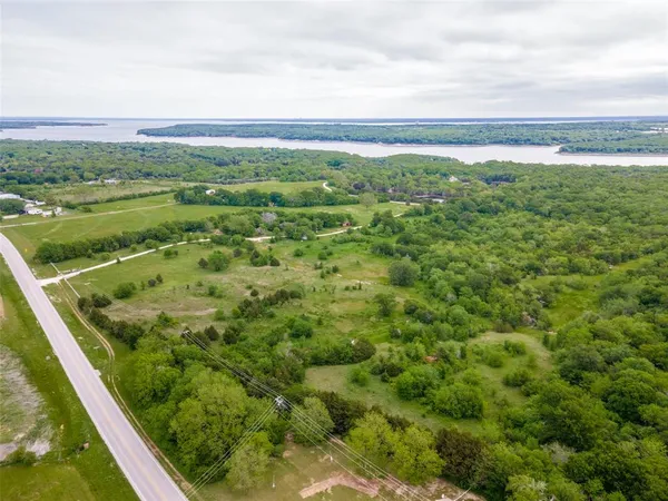 a view of a lake with a big yard