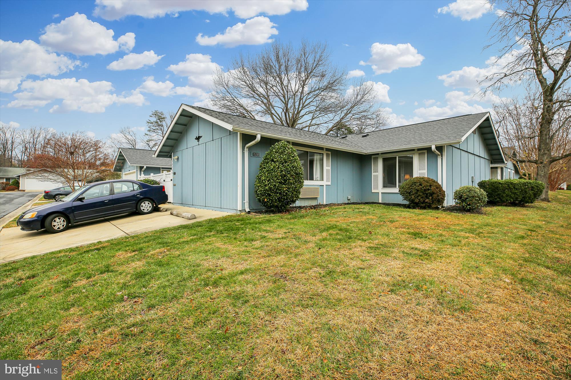 15205 Tottenham Terrace, Unit 24B Silver Spring, MD 20906 - Photo 14 of 33 a front view of a house with a yard and garage