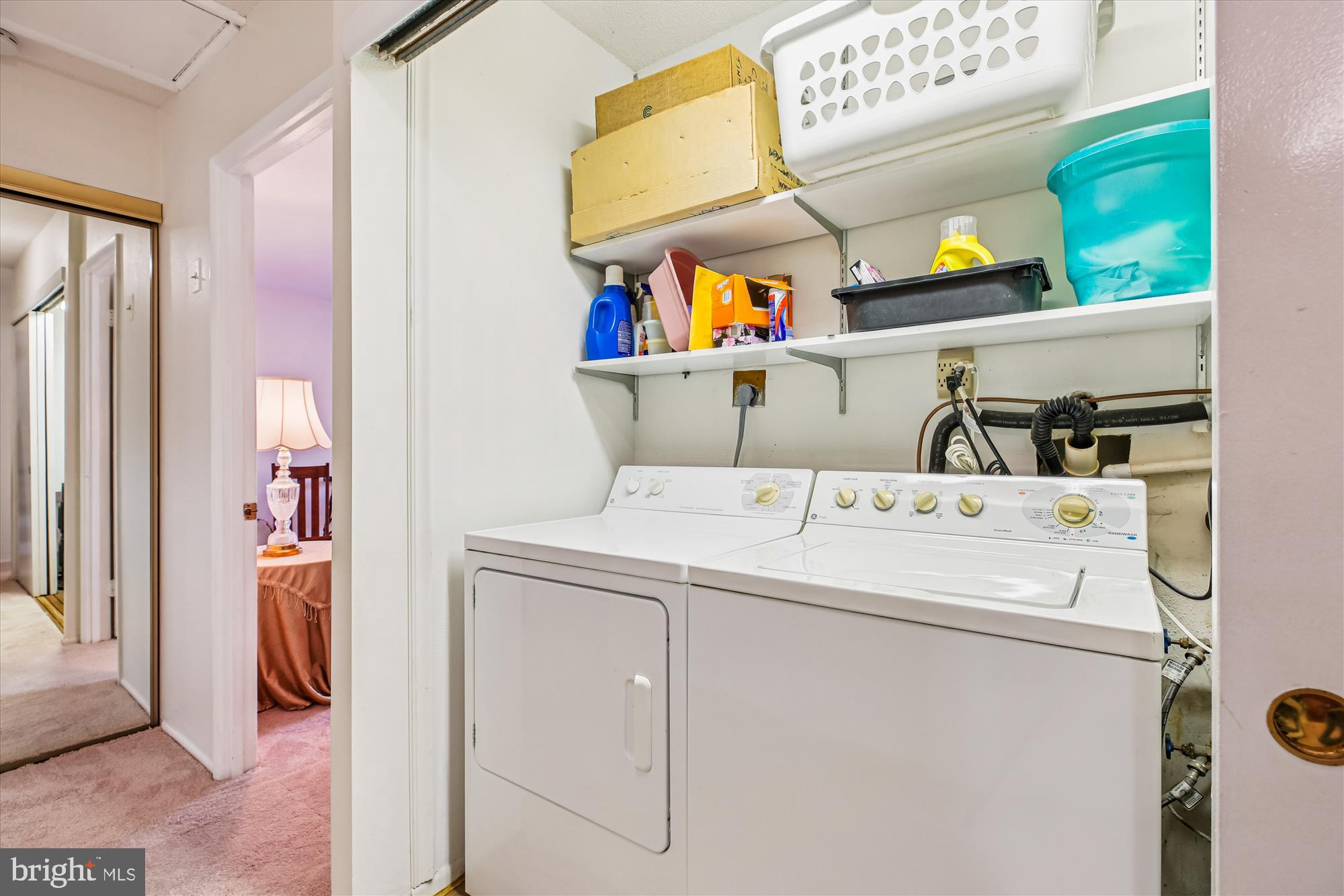 15205 Tottenham Terrace, Unit 24B Silver Spring, MD 20906 - Photo 15 of 33 a utility room with dryer and washer