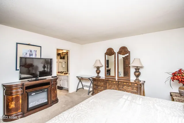 a view of living room with furniture and flat screen tv