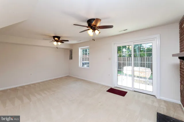 a view of a livingroom with furniture