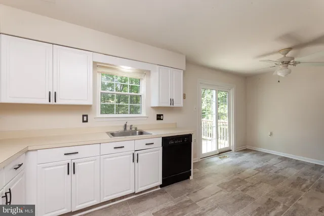 an empty room with a empty space and window