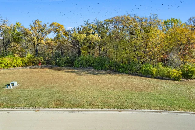 a view of a field with an outdoor space