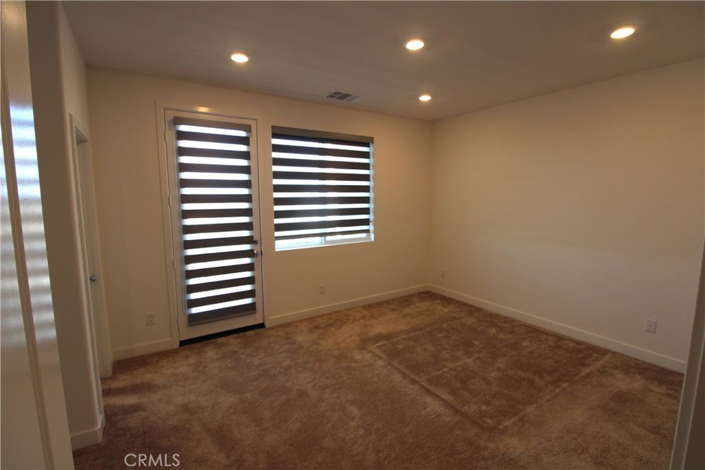 398 Merit Irvine, CA 92618 - Photo 16 of 25 a view of an empty room with a window