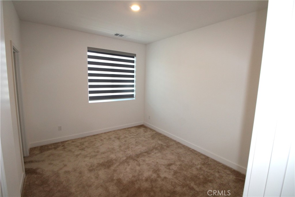 398 Merit Irvine, CA 92618 - Photo 23 of 25 an empty room with a window