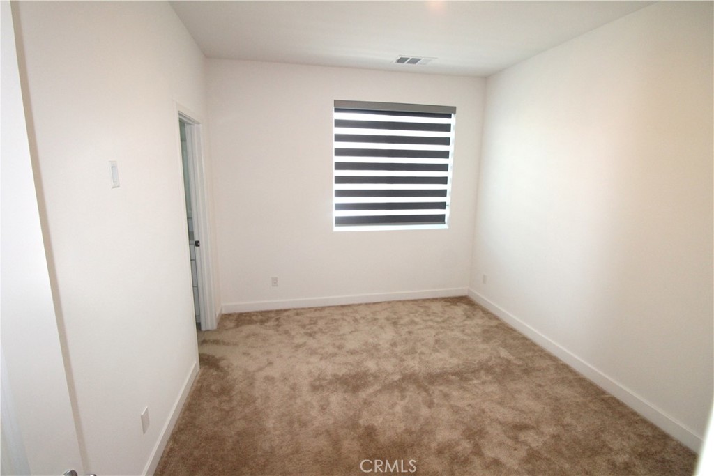 398 Merit Irvine, CA 92618 - Photo 24 of 25 a view of an empty room with a window