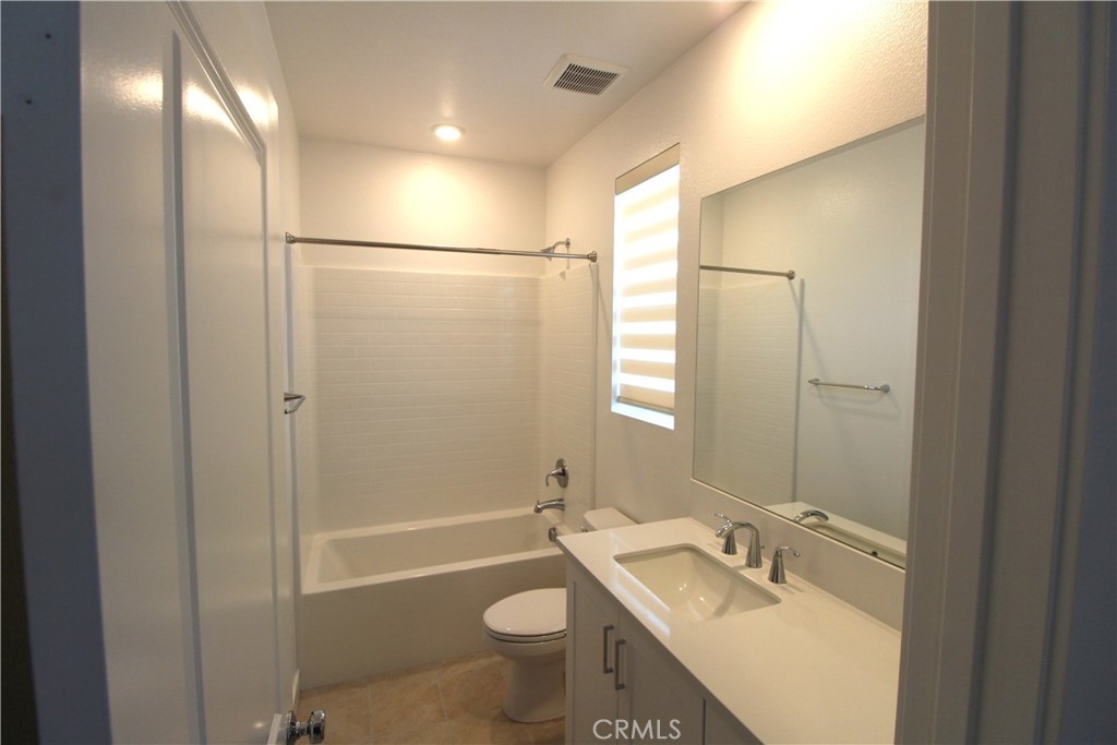 398 Merit Irvine, CA 92618 - Photo 25 of 25 a bathroom with a sink toilet tub and shower