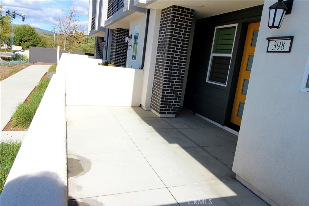 398 Merit Irvine, CA 92618 - Photo 4 of 25 a view of a pathway of a building