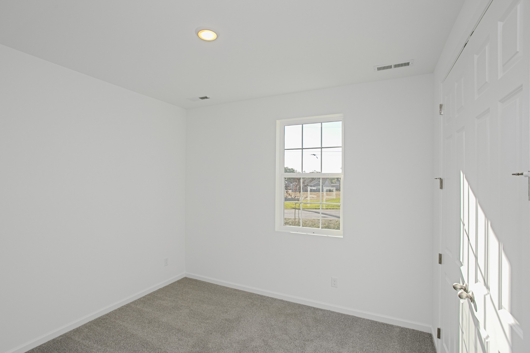 702 West Chestnut Street Dickson, TN 37055 - Photo 3 of 37 an empty room with windows