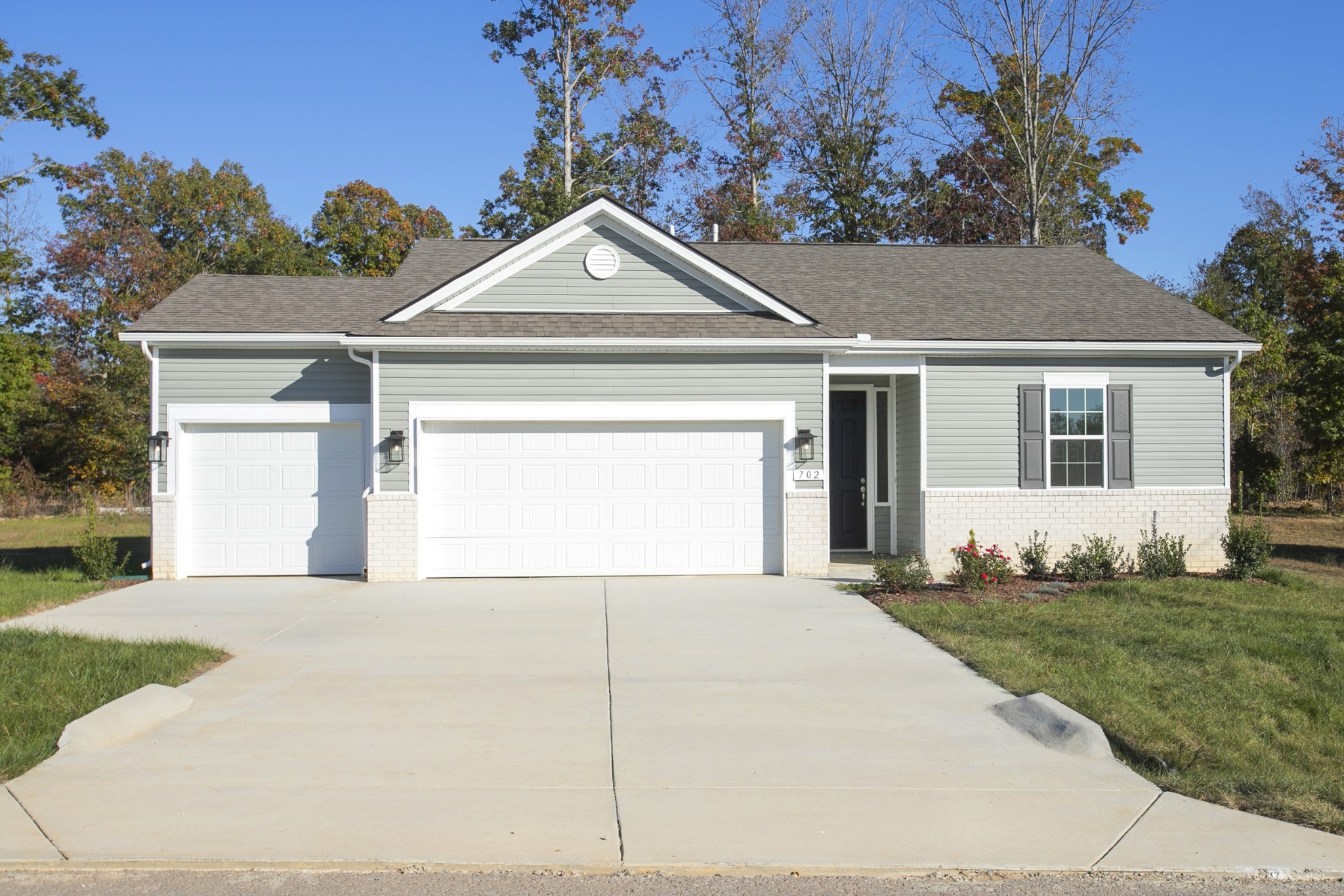702 West Chestnut Street Dickson, TN 37055 - Photo 36 of 37 a front view of a house with a yard