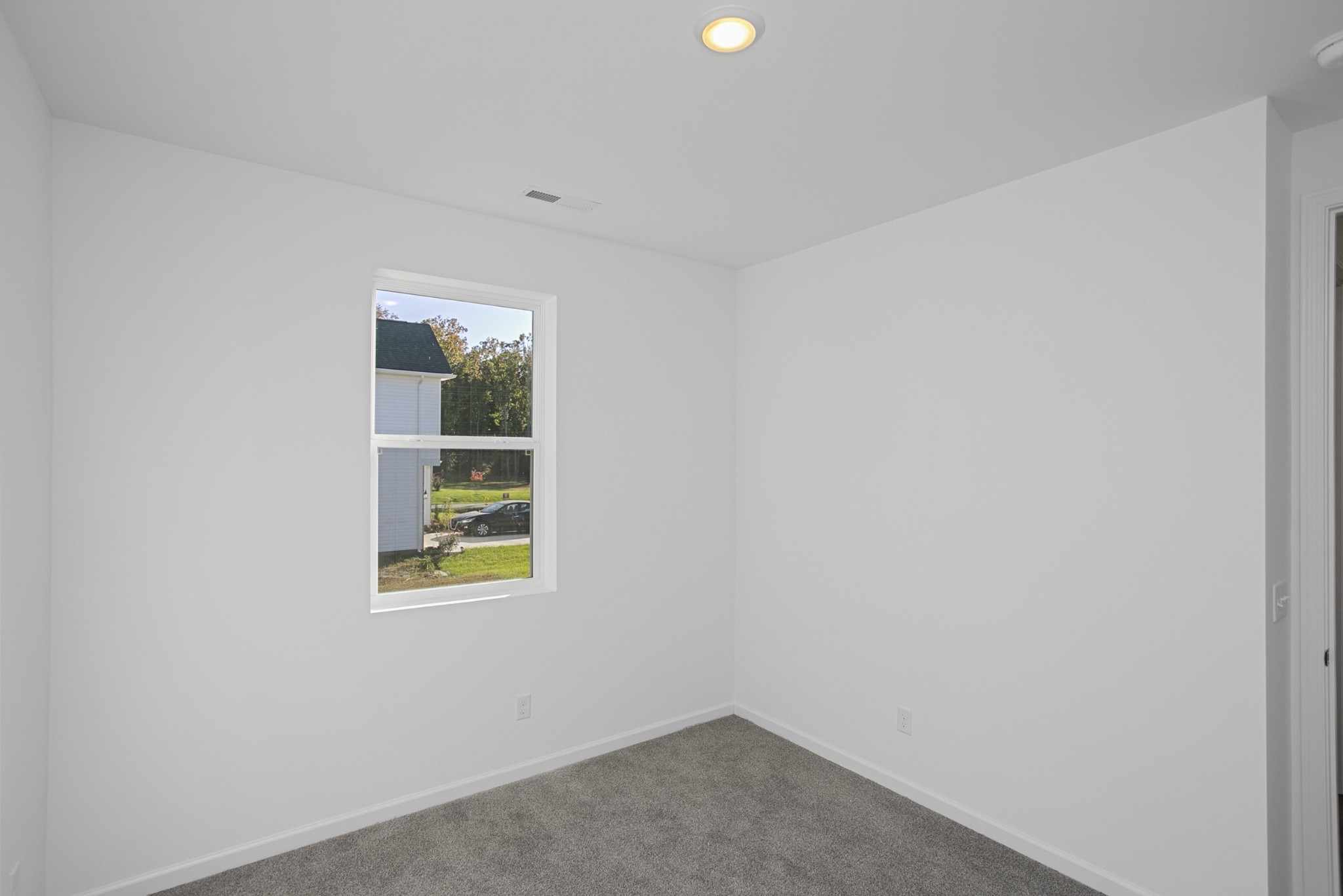 702 West Chestnut Street Dickson, TN 37055 - Photo 10 of 37 an empty room with windows