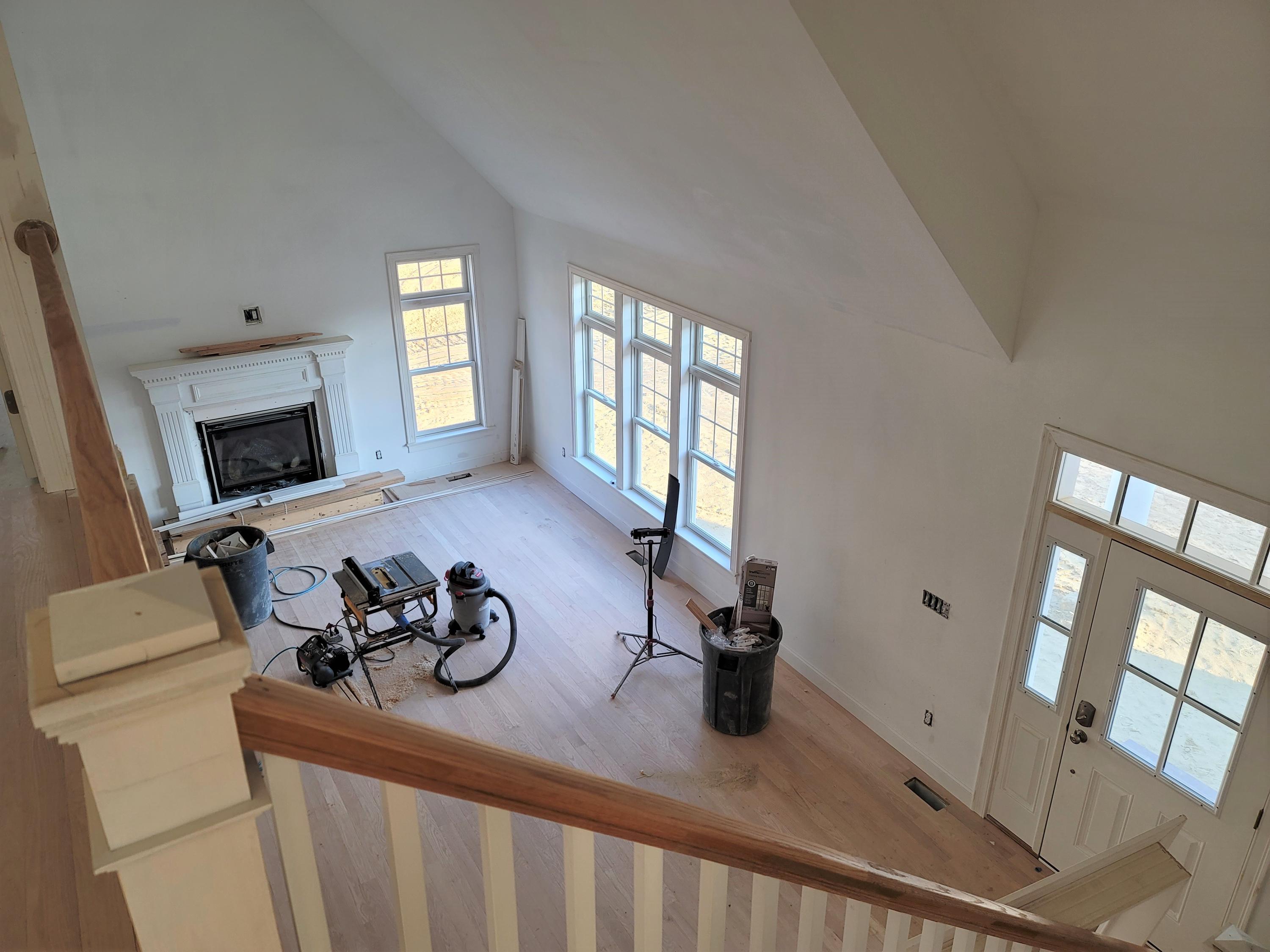 61 Blue Castle Drive Mashpee, MA 02649 - Photo 13 of 28 a view of a livingroom with furniture hardwood floor and a ceiling fan