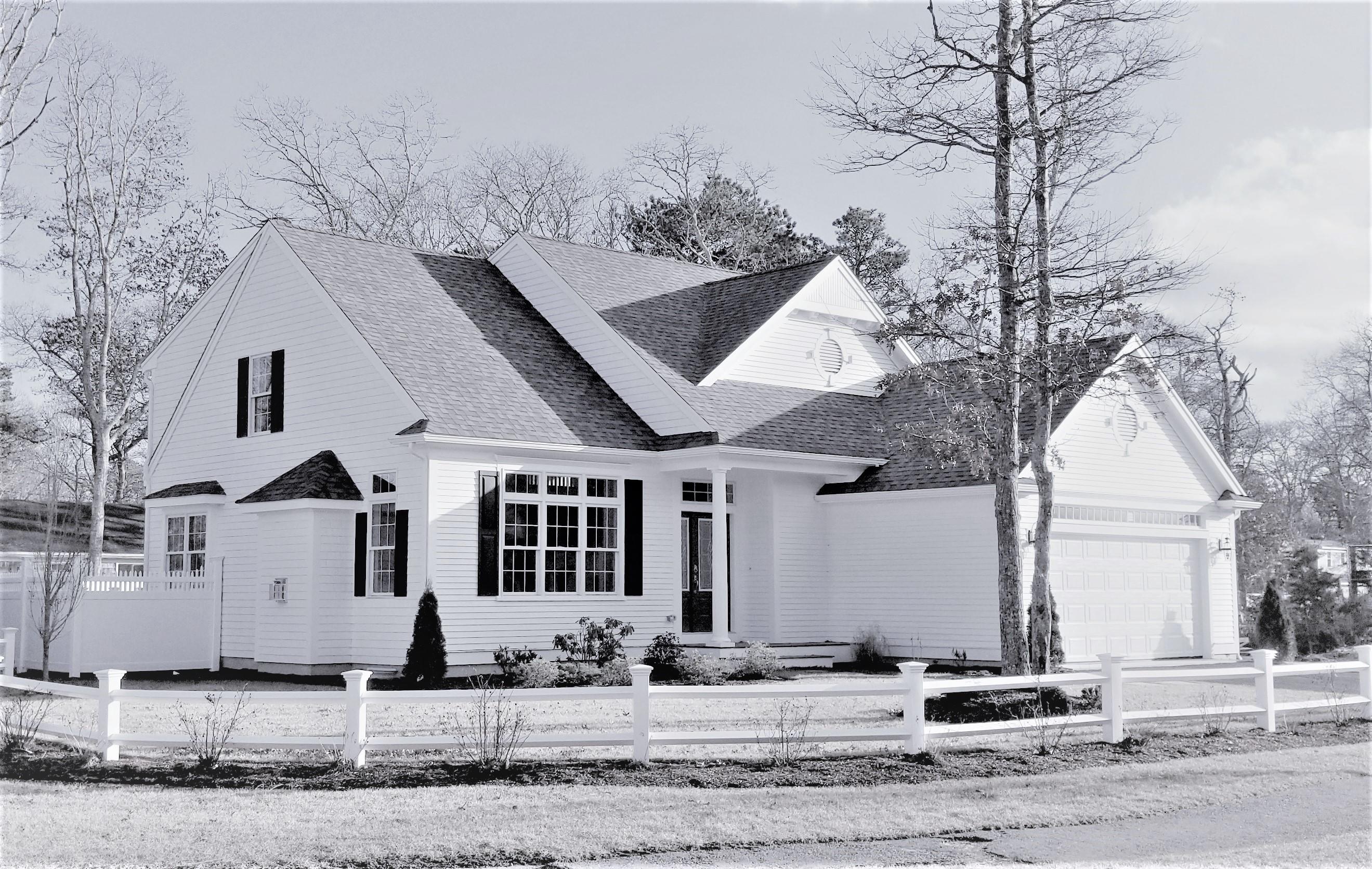61 Blue Castle Drive Mashpee, MA 02649 - Photo 21 of 28 a front view of a house with a yard