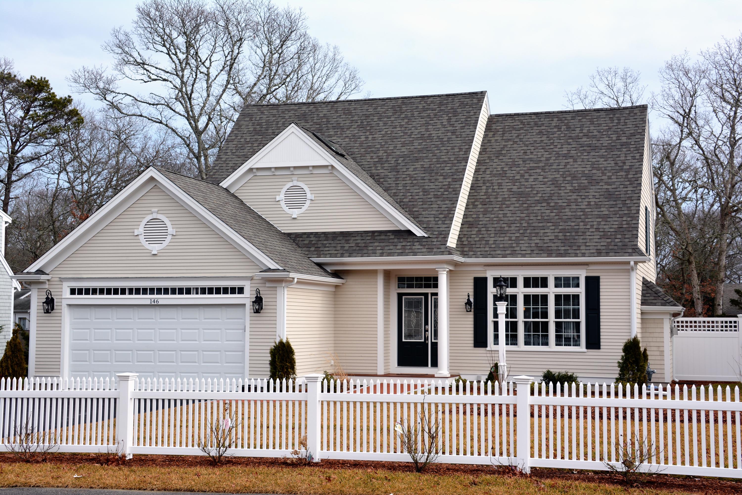 61 Blue Castle Drive Mashpee, MA 02649 - Photo 22 of 28 a house view with a garden