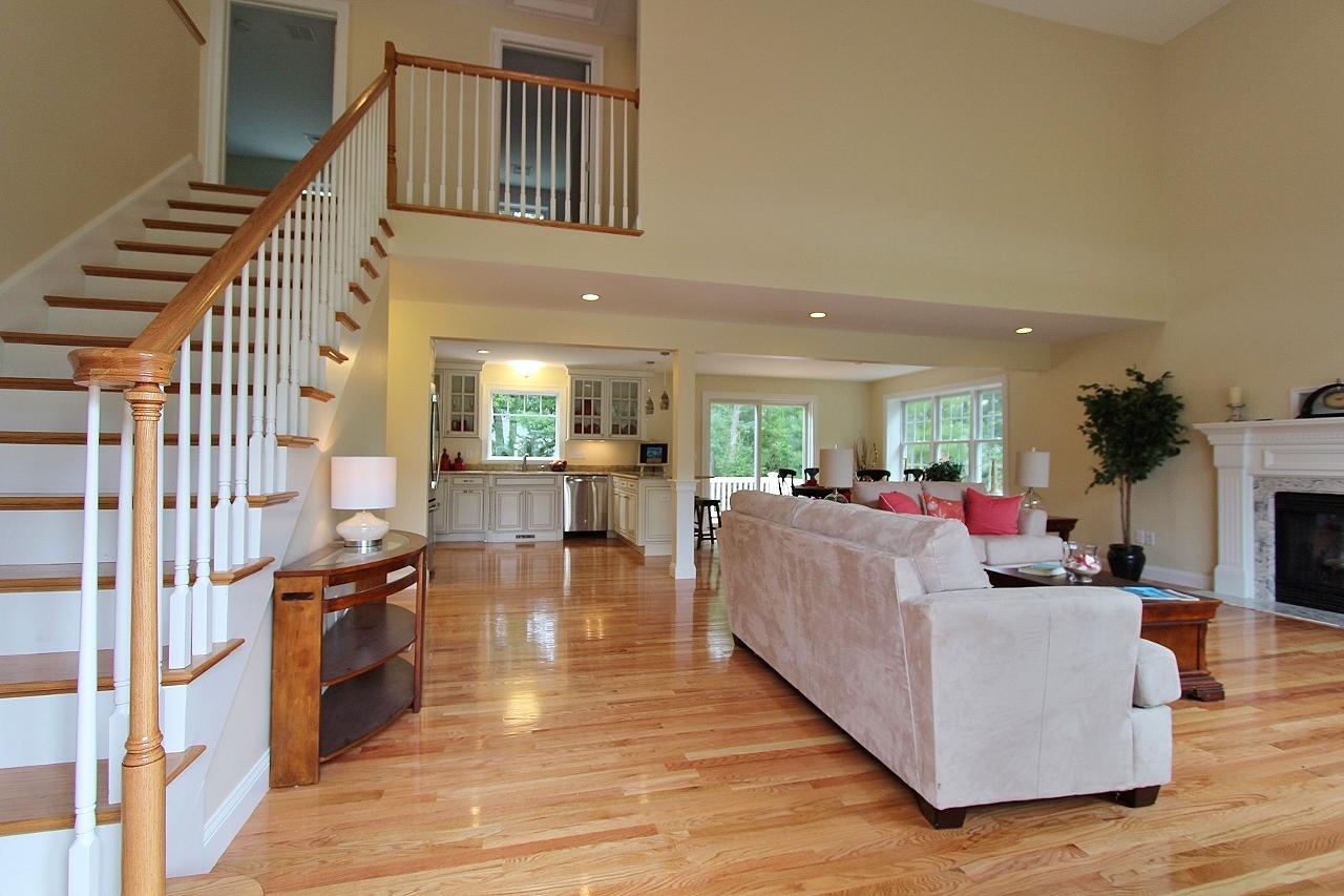 61 Blue Castle Drive Mashpee, MA 02649 - Photo 24 of 28 a living room with furniture and a wooden floor