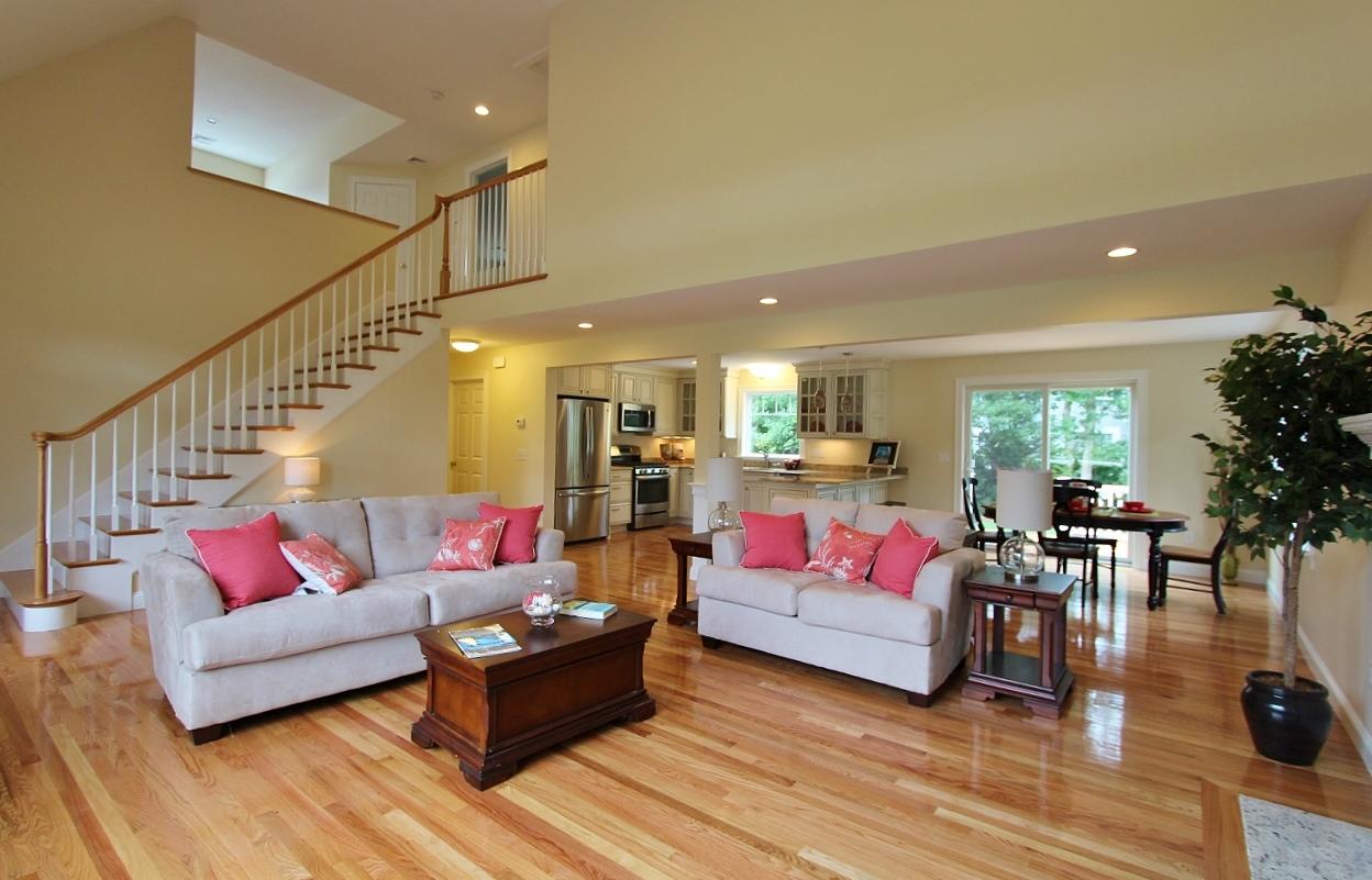 61 Blue Castle Drive Mashpee, MA 02649 - Photo 25 of 28 a living room with furniture and wooden floor
