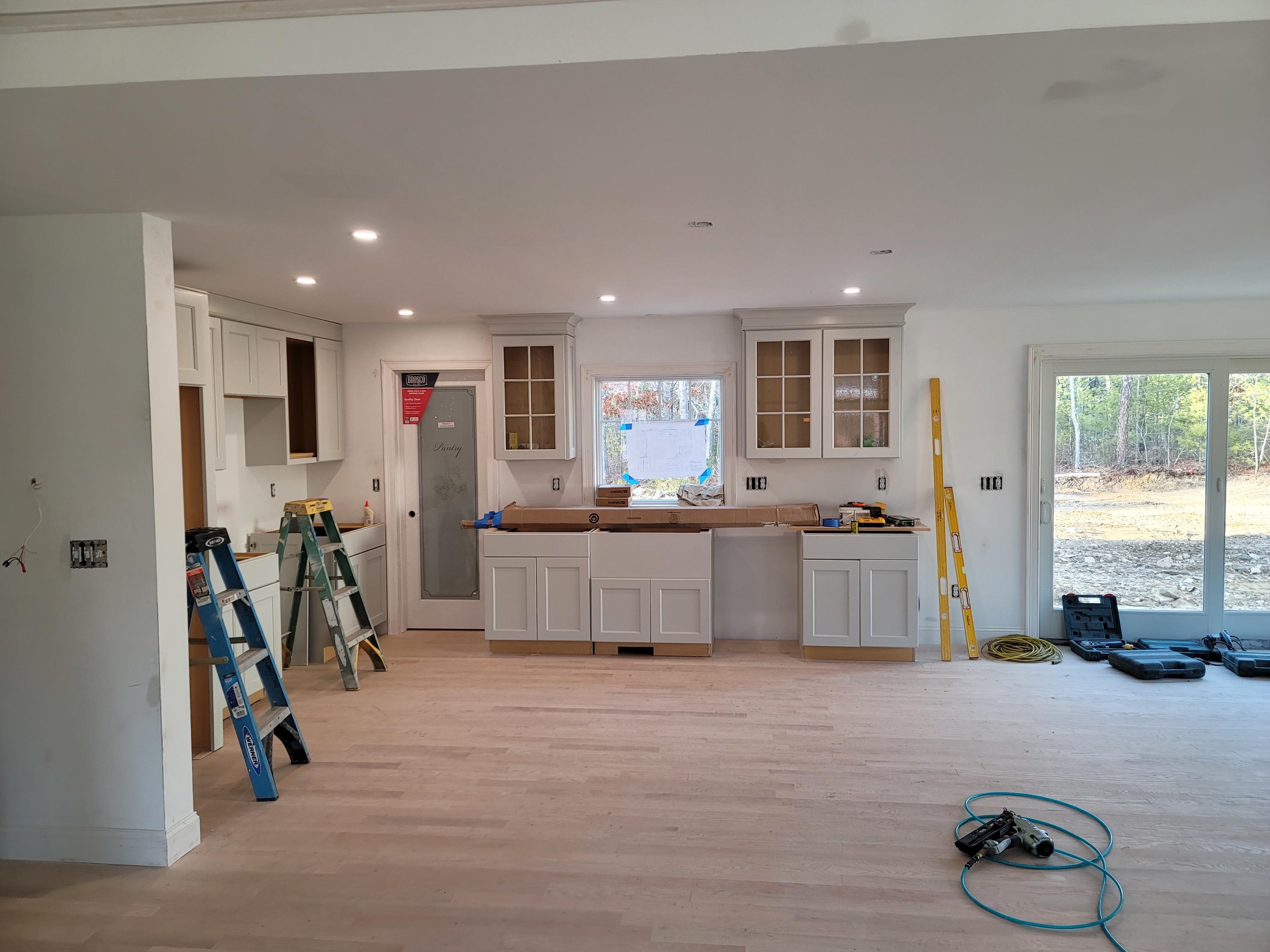61 Blue Castle Drive Mashpee, MA 02649 - Photo 3 of 28 a living room with furniture and a flat screen tv
