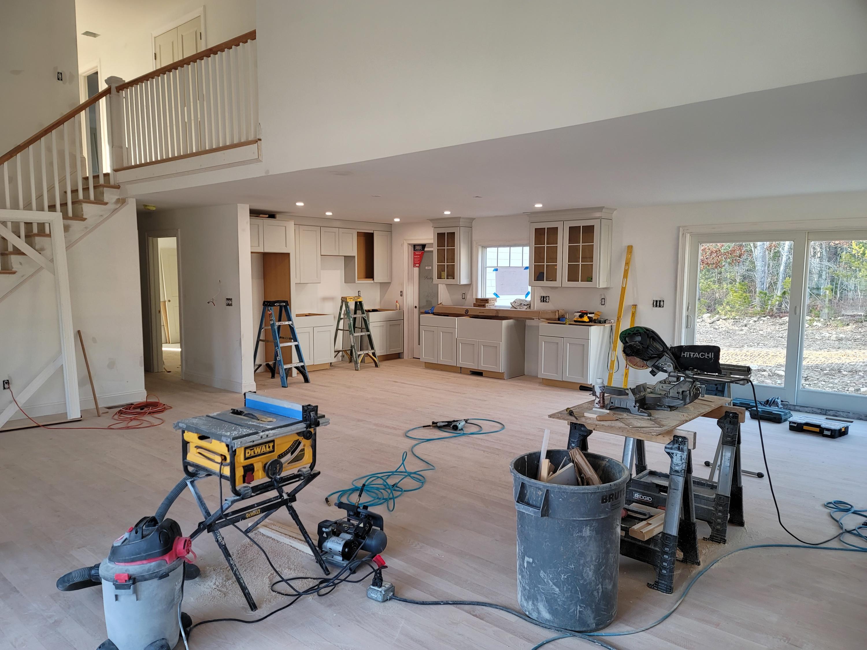 61 Blue Castle Drive Mashpee, MA 02649 - Photo 5 of 28 a living room with furniture a flat screen tv and a large window
