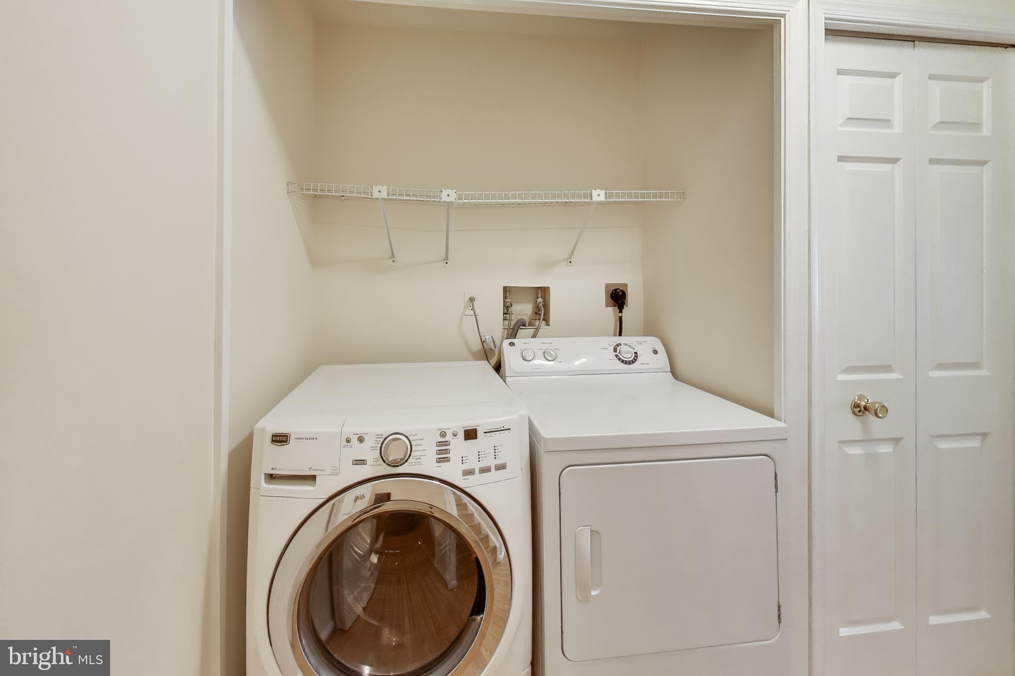 10408 Parthenon Court, Unit 10408 Bethesda, MD 20817 - Photo 11 of 34 a utility room with dryer and washer